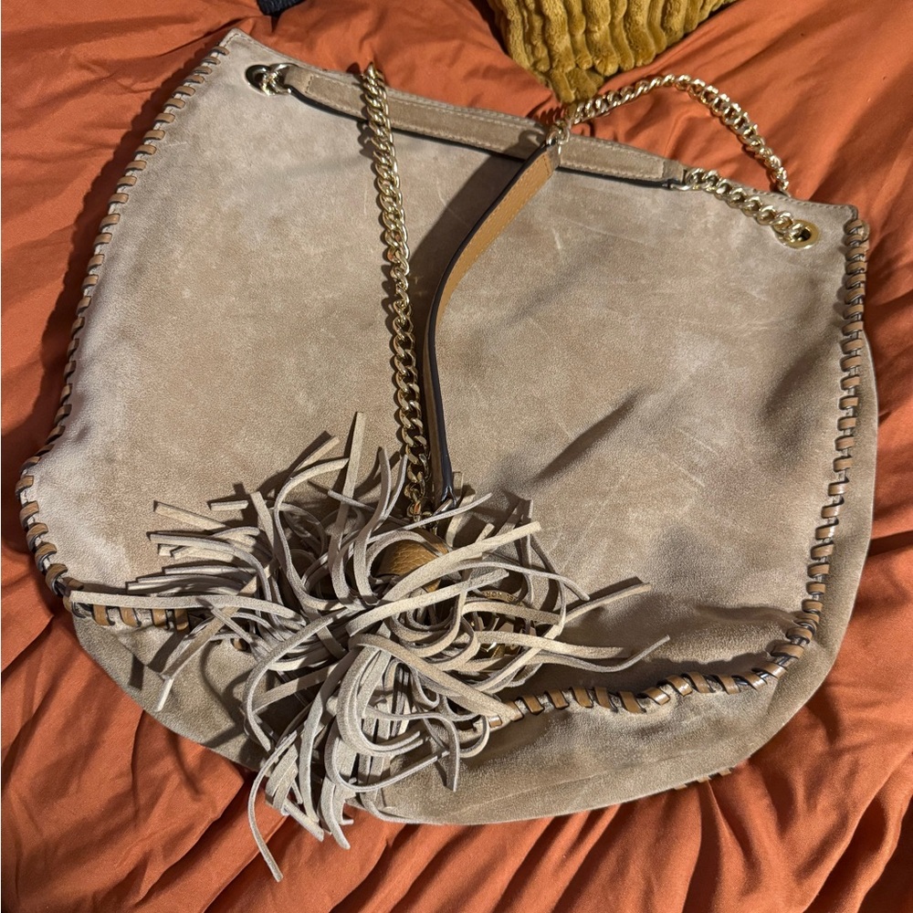 Stylish Tan Leather Bag with Fringe Detail